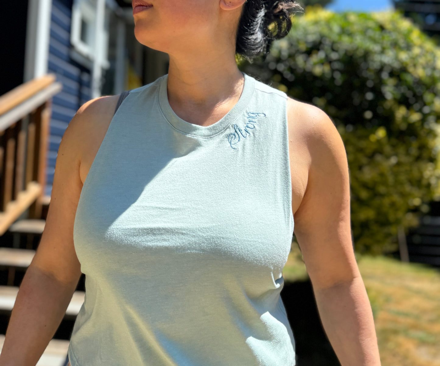 Bella + Canvas Racerback Crop Tank with Embroidered Curved Neckline "Strong"