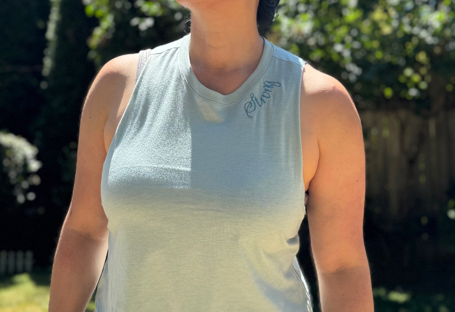 Bella + Canvas Racerback Crop Tank with Embroidered Curved Neckline "Strong"
